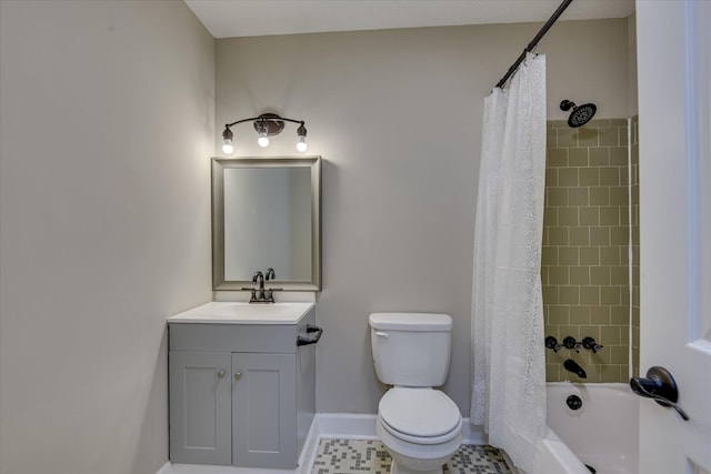 full bath with toilet, shower / bath combo, vanity, and baseboards