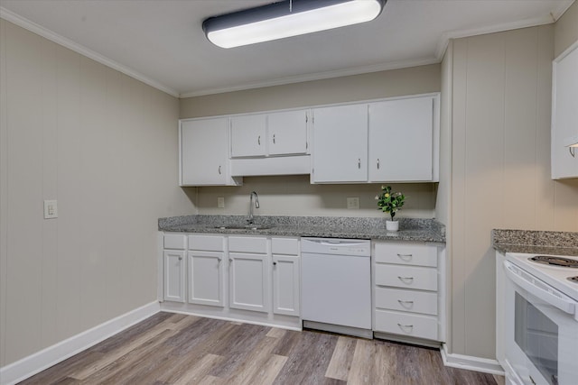 kitchen featuring a sink, white cabinetry, wood finished floors, and white appliances