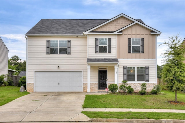 craftsman-style home featuring a front yard and a garage