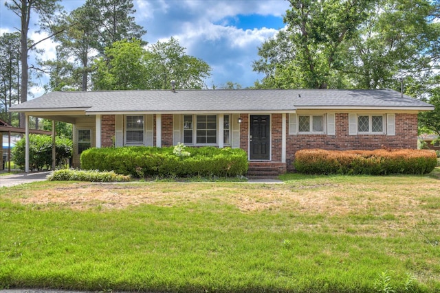 3609 Fairfax Ct, Augusta, GA 30906 - single story home with brick siding, a front yard, and an attached carport
