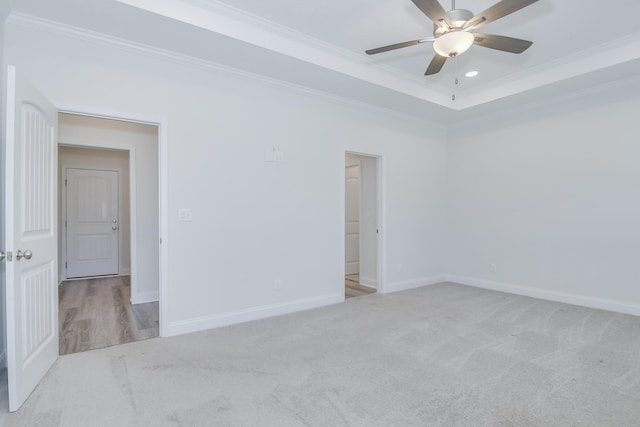 326 Agape Ln, Trenton, SC 29847 - carpeted spare room featuring ornamental molding, a ceiling fan, a tray ceiling, and recessed lighting