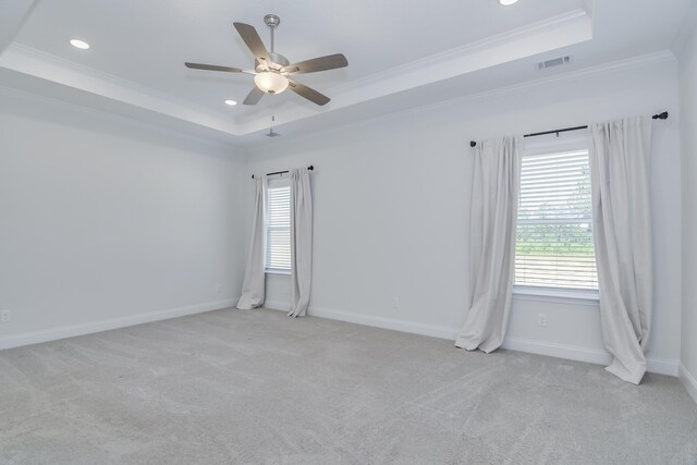 326 Agape Ln, Trenton, SC 29847 - carpeted empty room featuring a tray ceiling, plenty of natural light, crown molding, ceiling fan, and recessed lighting