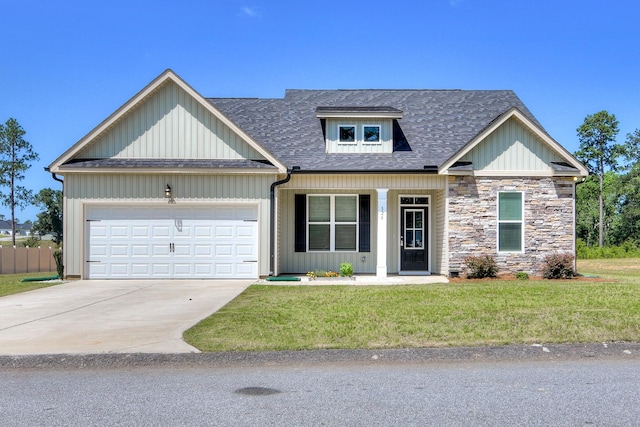 326 Agape Ln, Trenton, SC 29847 - view of front of house with roof with shingles, an attached garage, concrete driveway, a porch, and board and batten siding