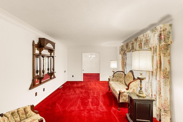 living area with carpet floors and ornamental molding