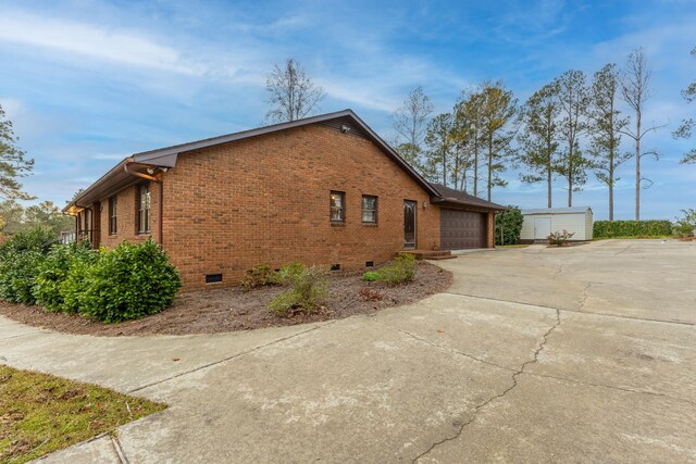 view of home's exterior with a garage