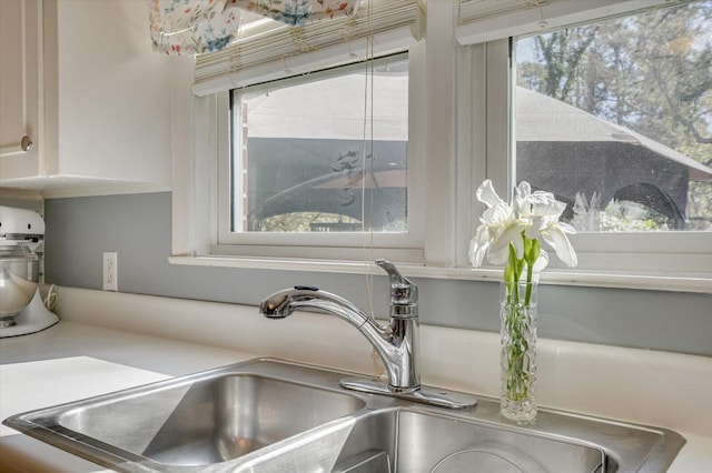 413 Park Dr, Waynesboro, GA 30830 - details with light countertops and a sink