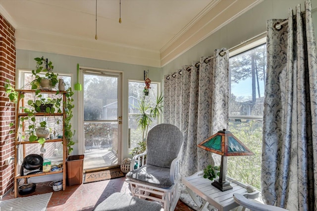 413 Park Dr, Waynesboro, GA 30830 - sunroom with crown molding, a healthy amount of sunlight, and brick floor