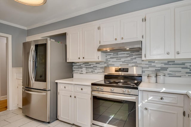 413 Park Dr, Waynesboro, GA 30830 - kitchen with ornamental molding, under cabinet range hood, white cabinetry, stainless steel appliances, and light countertops