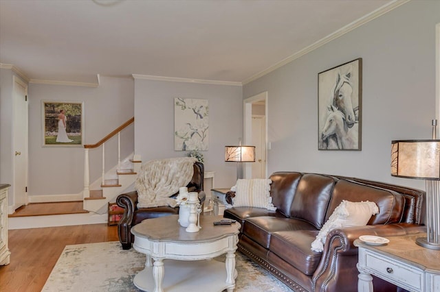 413 Park Dr, Waynesboro, GA 30830 - living room with light wood finished floors, stairway, crown molding, and baseboards