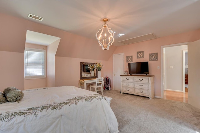 413 Park Dr, Waynesboro, GA 30830 - bedroom with visible vents, baseboards, light colored carpet, attic access, and lofted ceiling