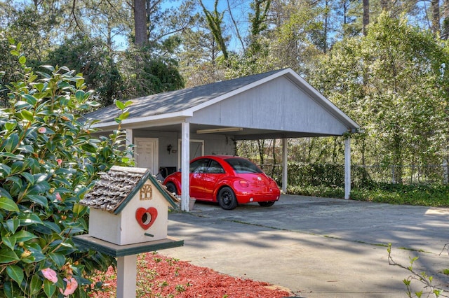 413 Park Dr, Waynesboro, GA 30830 - view of car parking featuring an attached carport, driveway, and fence
