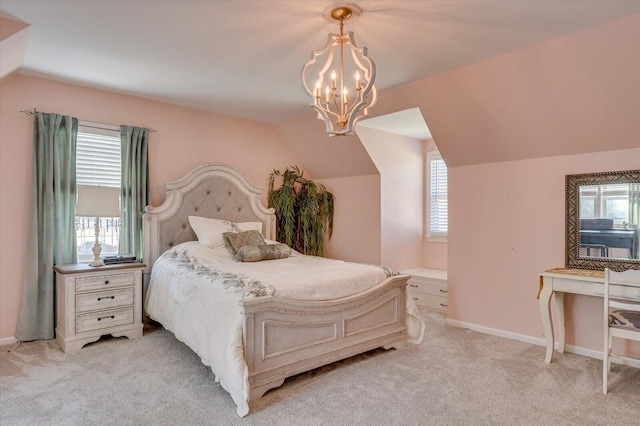 413 Park Dr, Waynesboro, GA 30830 - bedroom featuring vaulted ceiling, a notable chandelier, baseboards, and light carpet