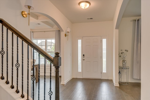 1207 Mary Hill Ct, Evans, GA 30809 - entrance foyer featuring arched walkways, coffered ceiling, dark wood-style flooring, and stairway