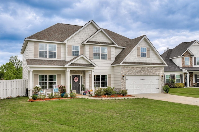 1207 Mary Hill Ct, Evans, GA 30809 - craftsman house with fence, stone siding, roof with shingles, concrete driveway, and an attached garage