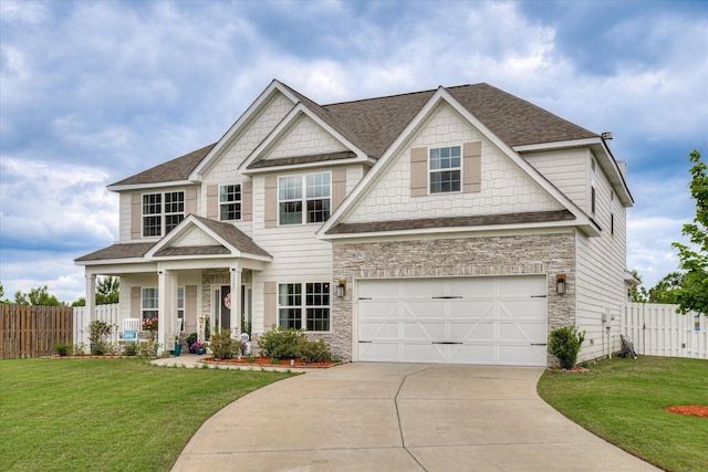 1207 Mary Hill Ct, Evans, GA 30809 - craftsman-style home featuring fence, a shingled roof, a garage, and stone siding
