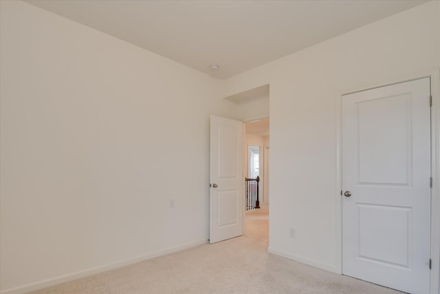 1207 Mary Hill Ct, Evans, GA 30809 - unfurnished bedroom featuring baseboards and light carpet