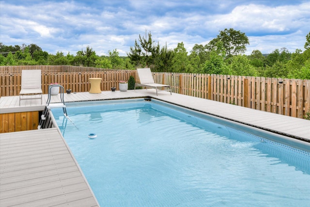 1207 Mary Hill Ct, Evans, GA 30809 - view of swimming pool with a fenced in pool, fence, and a deck
