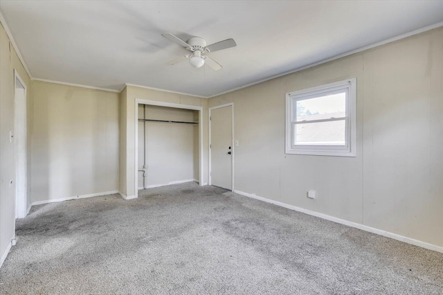 unfurnished bedroom featuring carpet floors and ceiling fan