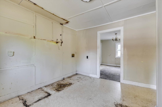 empty room with a notable chandelier