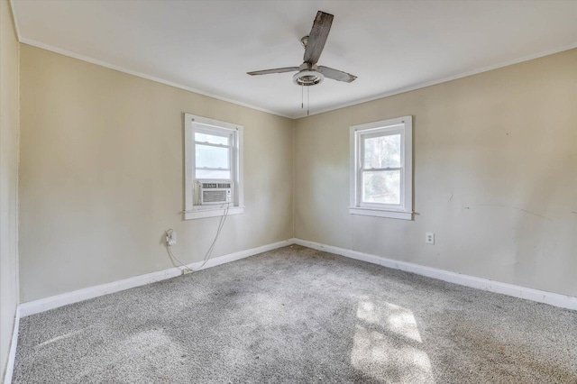 unfurnished room featuring carpet flooring, ceiling fan, cooling unit, and ornamental molding