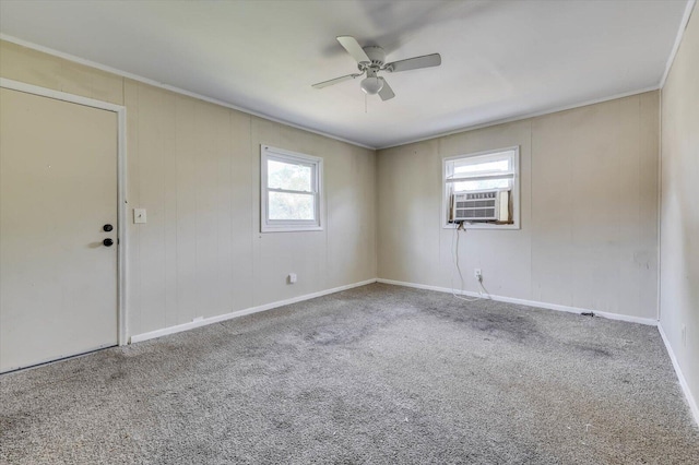 unfurnished room with ceiling fan, carpet, and a healthy amount of sunlight