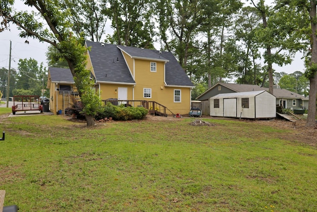 650 Kemper Dr, Evans, GA 30809 - rear view of house with a storage shed, a deck, and a lawn