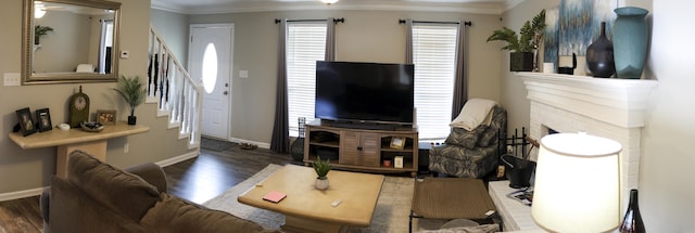 650 Kemper Dr, Evans, GA 30809 - living area with wood finished floors, crown molding, and stairway