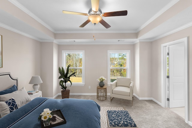 bedroom with light carpet, a tray ceiling, ornamental molding, and baseboards