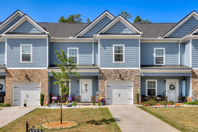 1222 Jessie Way, Augusta, GA 30906 - view of front facade with a garage, covered porch, driveway, and a front lawn