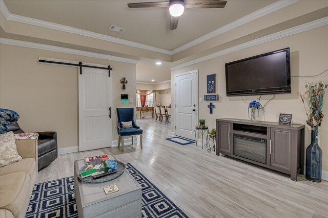 1222 Jessie Way, Augusta, GA 30906 - living area featuring baseboards, recessed lighting, a barn door, a ceiling fan, and light wood-style flooring
