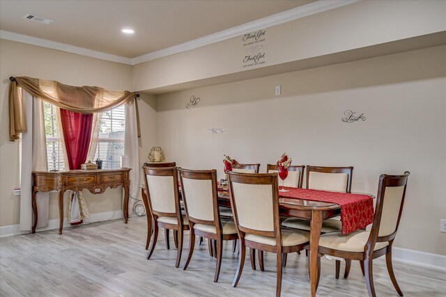 1222 Jessie Way, Augusta, GA 30906 - dining room featuring baseboards, ornamental molding, light wood-type flooring, and visible vents