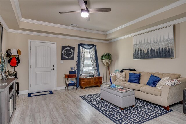 1222 Jessie Way, Augusta, GA 30906 - living room featuring a ceiling fan, a tray ceiling, light wood finished floors, and visible vents