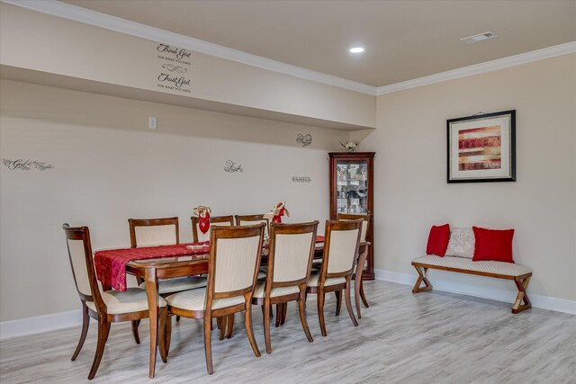 1222 Jessie Way, Augusta, GA 30906 - dining space featuring baseboards, visible vents, ornamental molding, and light wood-type flooring