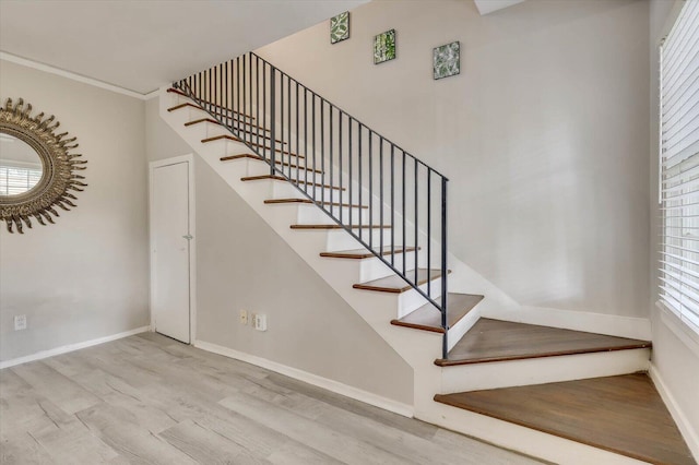 stairway with wood-type flooring