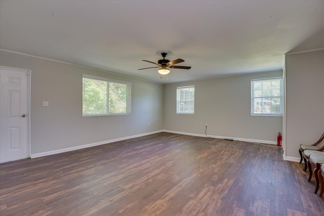 813 Hammond Dr, North Augusta, SC 29841 - spare room featuring plenty of natural light, dark wood-type flooring, a ceiling fan, ornamental molding, and baseboards
