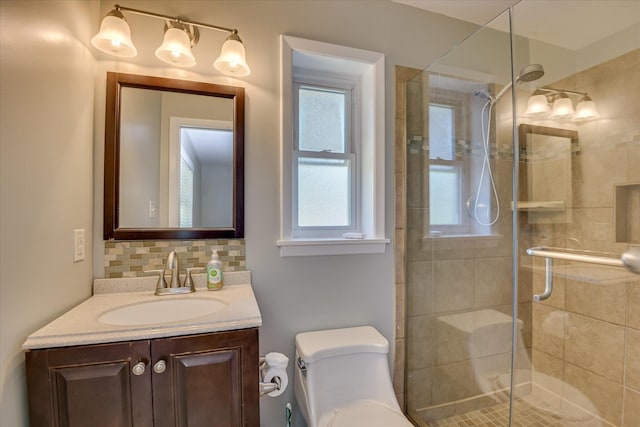 813 Hammond Dr, North Augusta, SC 29841 - bathroom with vanity, toilet, decorative backsplash, and a stall shower