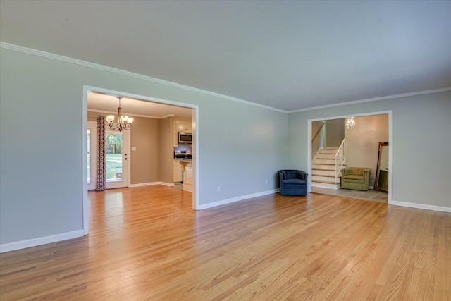 813 Hammond Dr, North Augusta, SC 29841 - unfurnished living room featuring a chandelier, crown molding, light wood finished floors, stairway, and baseboards