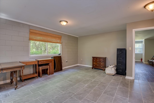 813 Hammond Dr, North Augusta, SC 29841 - unfurnished dining area featuring crown molding and baseboards