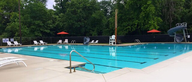 813 Hammond Dr, North Augusta, SC 29841 - community pool with a water slide and a patio area