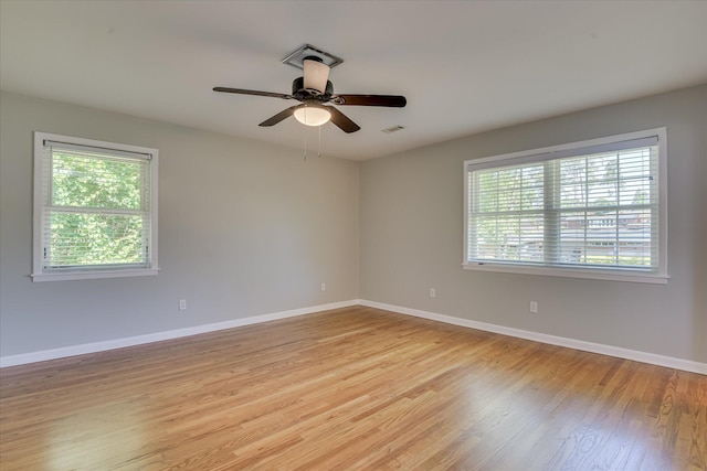 813 Hammond Dr, North Augusta, SC 29841 - unfurnished room featuring healthy amount of natural light, light wood finished floors, baseboards, and ceiling fan