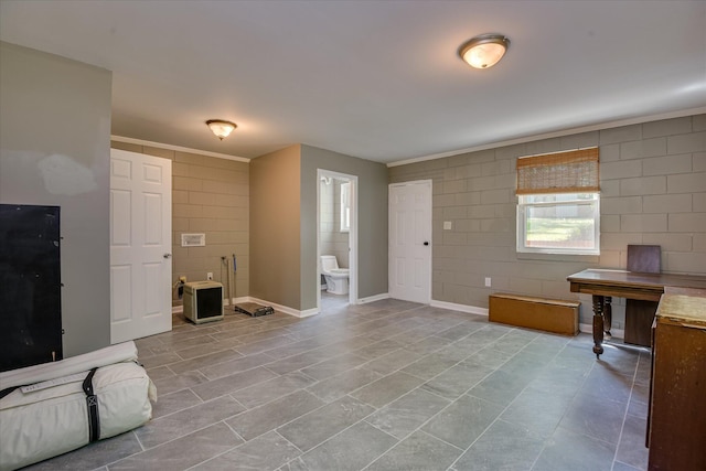 813 Hammond Dr, North Augusta, SC 29841 - living area with baseboards and concrete block wall