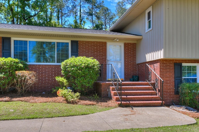 813 Hammond Dr, North Augusta, SC 29841 - view of exterior entry featuring brick siding and board and batten siding