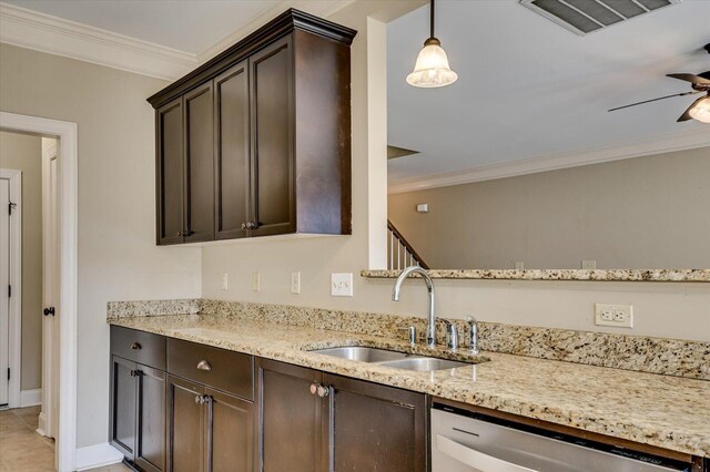 kitchen with ornamental molding, dark brown cabinetry, sink, pendant lighting, and dishwasher