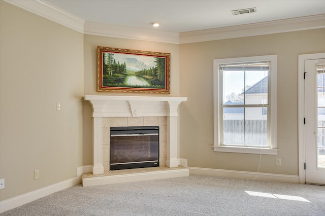 unfurnished living room featuring ornamental molding, a fireplace, and light carpet