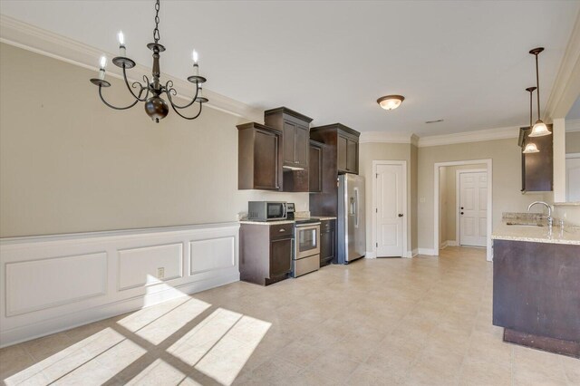 kitchen with a notable chandelier, crown molding, dark brown cabinets, and stainless steel appliances