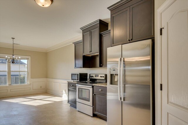 kitchen featuring an inviting chandelier, hanging light fixtures, ornamental molding, dark brown cabinets, and stainless steel appliances