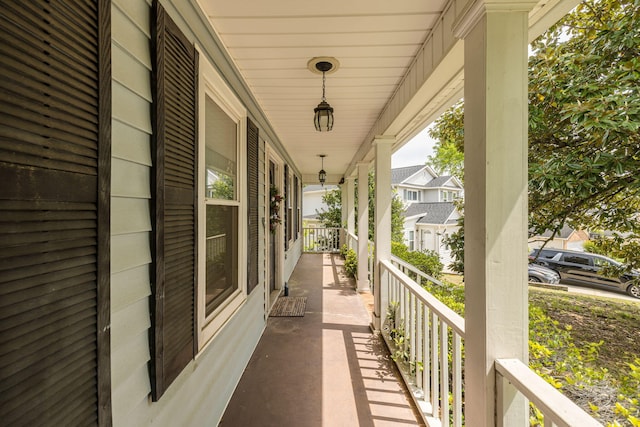 balcony featuring a porch