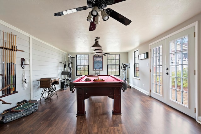 recreation room with dark hardwood / wood-style floors, ceiling fan, billiards, and french doors