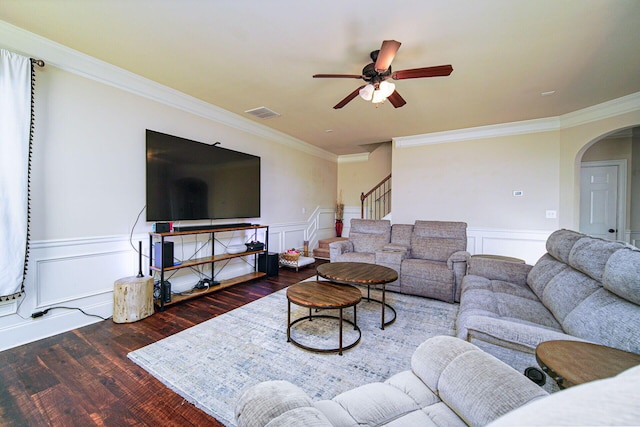 living room with ceiling fan, crown molding, and dark hardwood / wood-style flooring