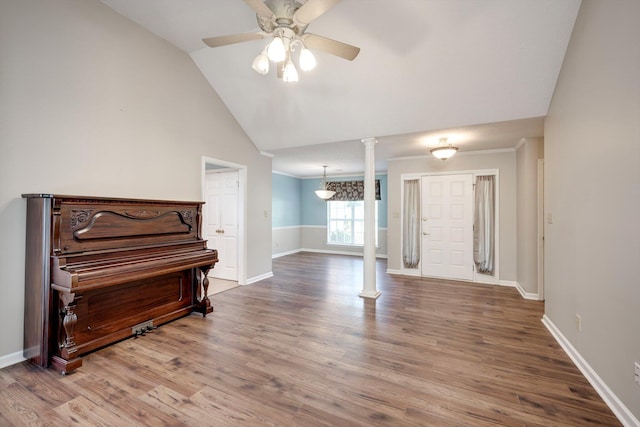 4610 Mulberry Creek Dr, Evans, GA 30809 - living area with ornate columns, wood finished floors, vaulted ceiling, and ceiling fan